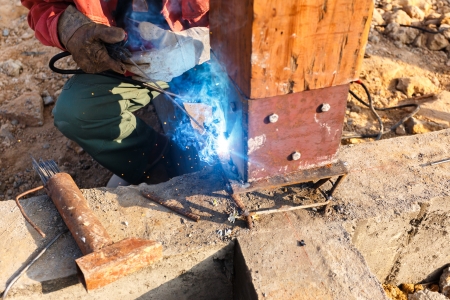 welding metal and wood by electrode with bright electric arcの写真素材