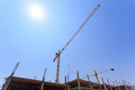 Construction Site with crane on blue sky 