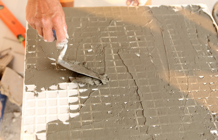 floor tile installation for house building の写真素材