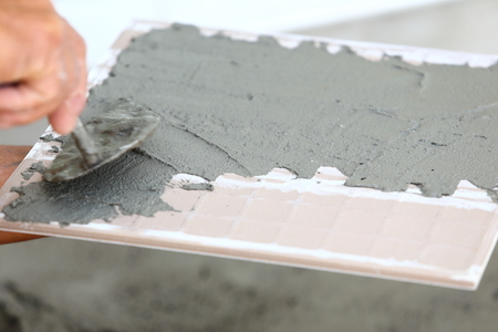 floor tile installation for house building の写真素材