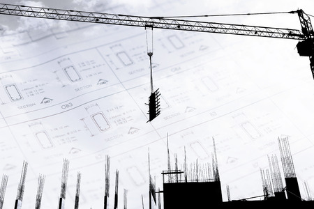 Crane working in construction siteの写真素材