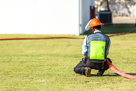 Firefighter fighting for fire attack trainingの写真素材