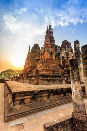 sukhothai historical park the old town of thailand on sunsetの写真素材