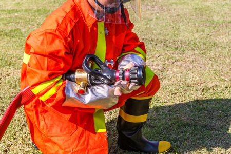 Firefighter fighting for fire attack training