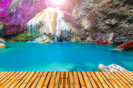 wonderful waterfall in thailand with bamboor floorの写真素材