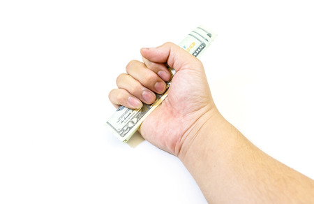 Dollars money in hand on white backgroundの写真素材