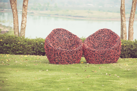 Red Chair in gardenの写真素材