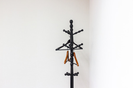 hanger clothes in white roomの写真素材