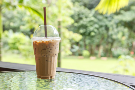 Ice coffee on table in cafeの写真素材