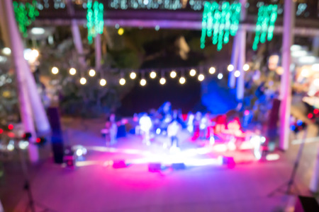 Mini concert in outdoor night club blurred