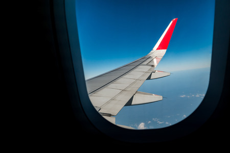 View plane wing from Airplane Windowの写真素材