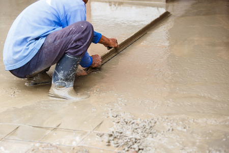 plasterer concrete worker at floor constructionの写真素材