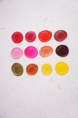 Colorful wax seal stamps on a white background. Selective focus.の写真素材