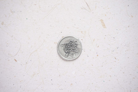 Coins of United Arab Emirates on paper background. Money concept.の写真素材