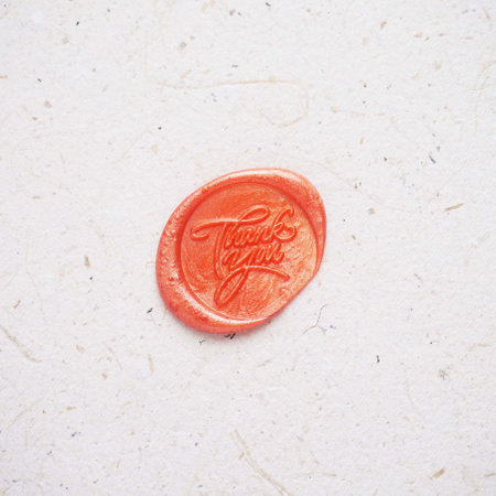 Vintage red wax seal stamp on a white background. Retro styleの写真素材