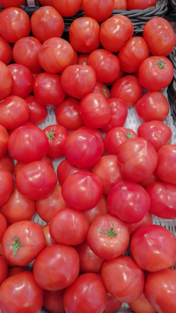 Tomatoes for sale at a farmers marketの写真素材