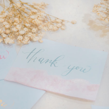 Greeting card with the words thank you and dried flowers.の写真素材