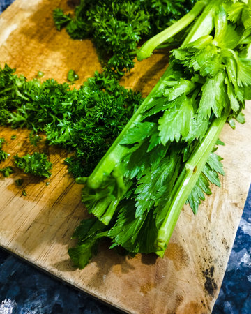Fresh green parsley on a cutting board. Healthy food concept.