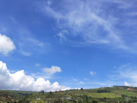 Landscape with blue sky and white clouds in the countryside of Thailand.の写真素材