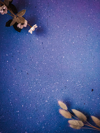 flowers on blue background with space for text, vintage tonedの写真素材