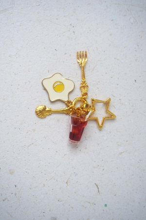 Eggs with spoon and fork on a white background, top view