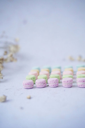 Colorful macaroons on a white background. Selective focus.