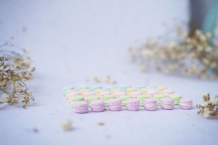 Colorful macarons on a white background. Selective focus.