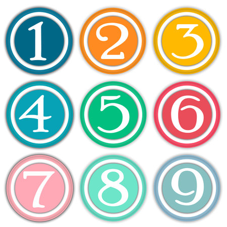 Numbers in bright colored paper circlesの写真素材