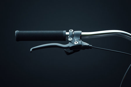 Bike handlebar on a dark background. Close-up.の写真素材