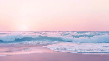 Soft wave of the sea on the sandy beach at sunset time.の写真素材
