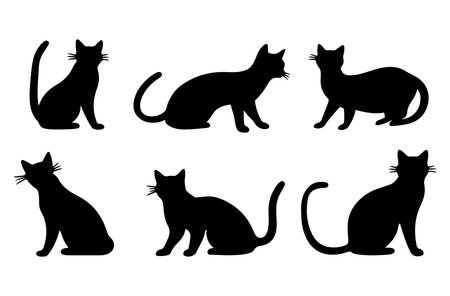 Set of black cats silhouettes isolated on white background. Vector illustration.のイラスト素材