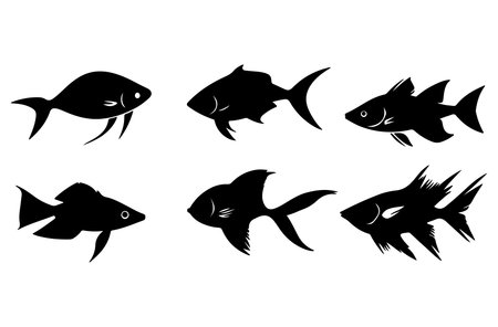 Set of black silhouettes of fish on a white background. Vector illustrationのイラスト素材