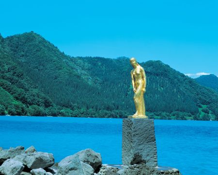 Woman Statue with Mountainの写真素材