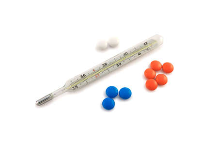 Thermometer and some pills.の写真素材