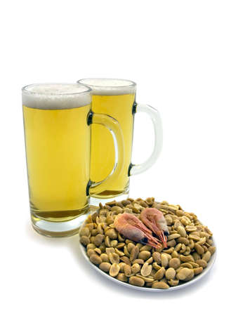 Two mugs of beer and plate with snacks. Clipping path included.の写真素材
