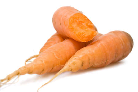 Pile of carrots isolated on white background.の写真素材