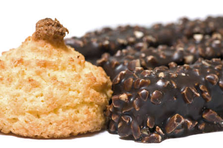 Closeup of coconut cookie and chocolate waffles isolated on white background.の写真素材
