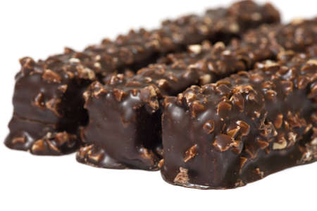 Side view of three chocolate waffles isolated on white backgroundの写真素材