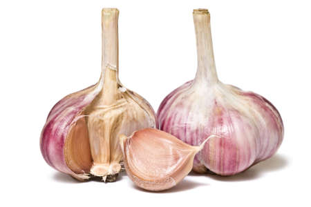 Pair of garlic bulbs isolated on white background.の写真素材