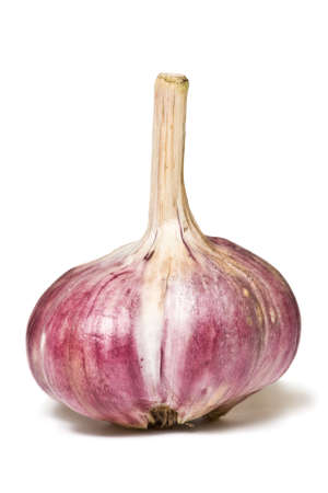 Red garlic bulb isolated on white background.の写真素材