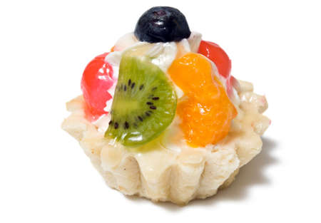 Closeup of single fruit tartlet isolated on white background.の写真素材