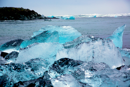 Glacier ice chunks on Diamond Beach at Jökullsarlon
