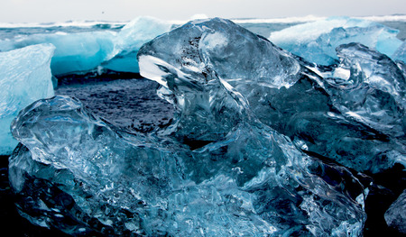 Glacier ice chunGlacier ice chunks on Diamond Beach from Eyjafjallajoekullk on Diamond Beachの写真素材