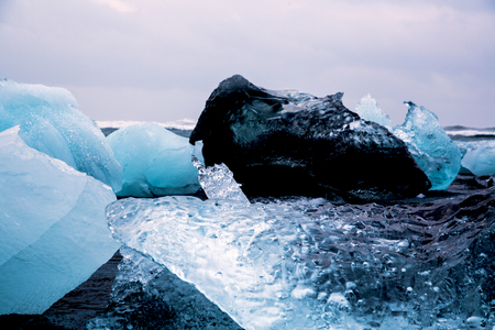Glacier ice chunGlacier ice chunks on Diamond Beach from Eyjafjallajoekullk on Diamond Beachの写真素材