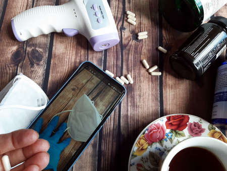 medication on the table, picture suggests getting sick, quarantine treatmentの写真素材