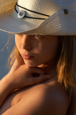 girls eyes covered by hatの写真素材