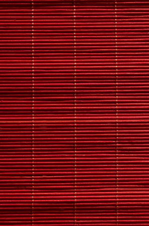 red bedding for plates and dishes made of thin sticksの写真素材