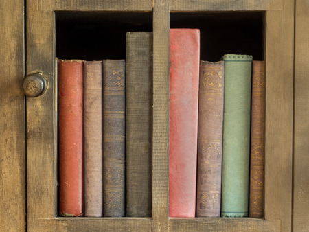 old books in an antique bookcase