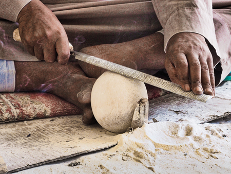 Egyptian Vase made of alabaster being worked on