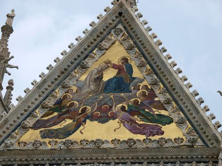 Siena - Duomo facade.The large central mosaic, the Coronation of the Virgin, is the work of Luigi Mussiniの写真素材
